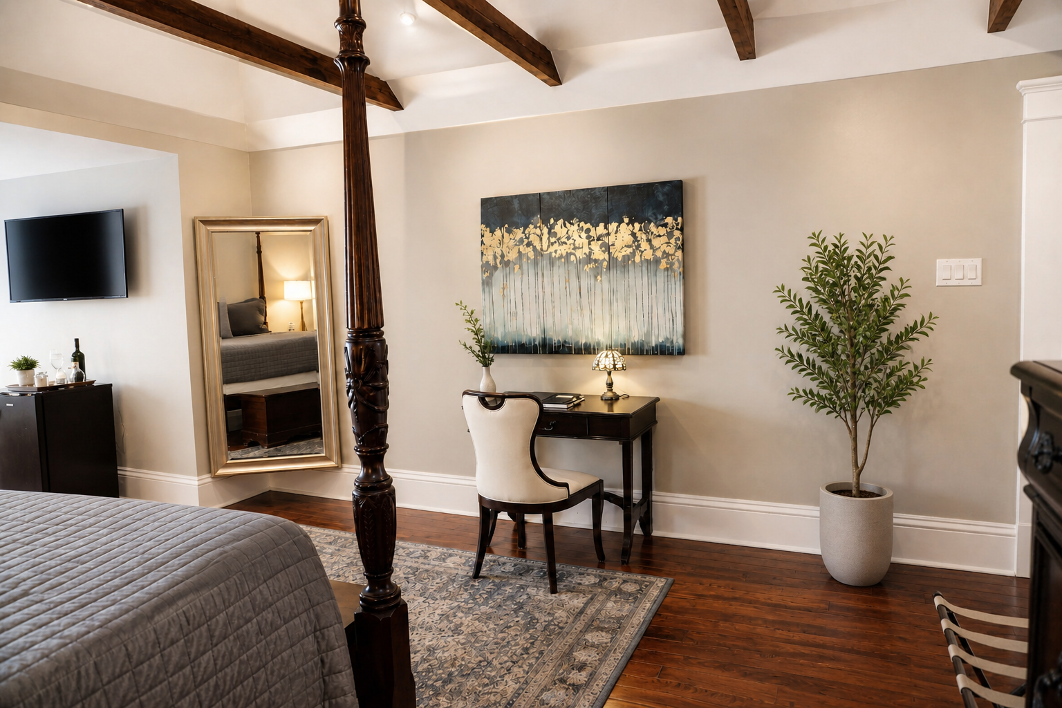 The Canal Street Room — writing desk, triptych artwork, and full-length mirror
